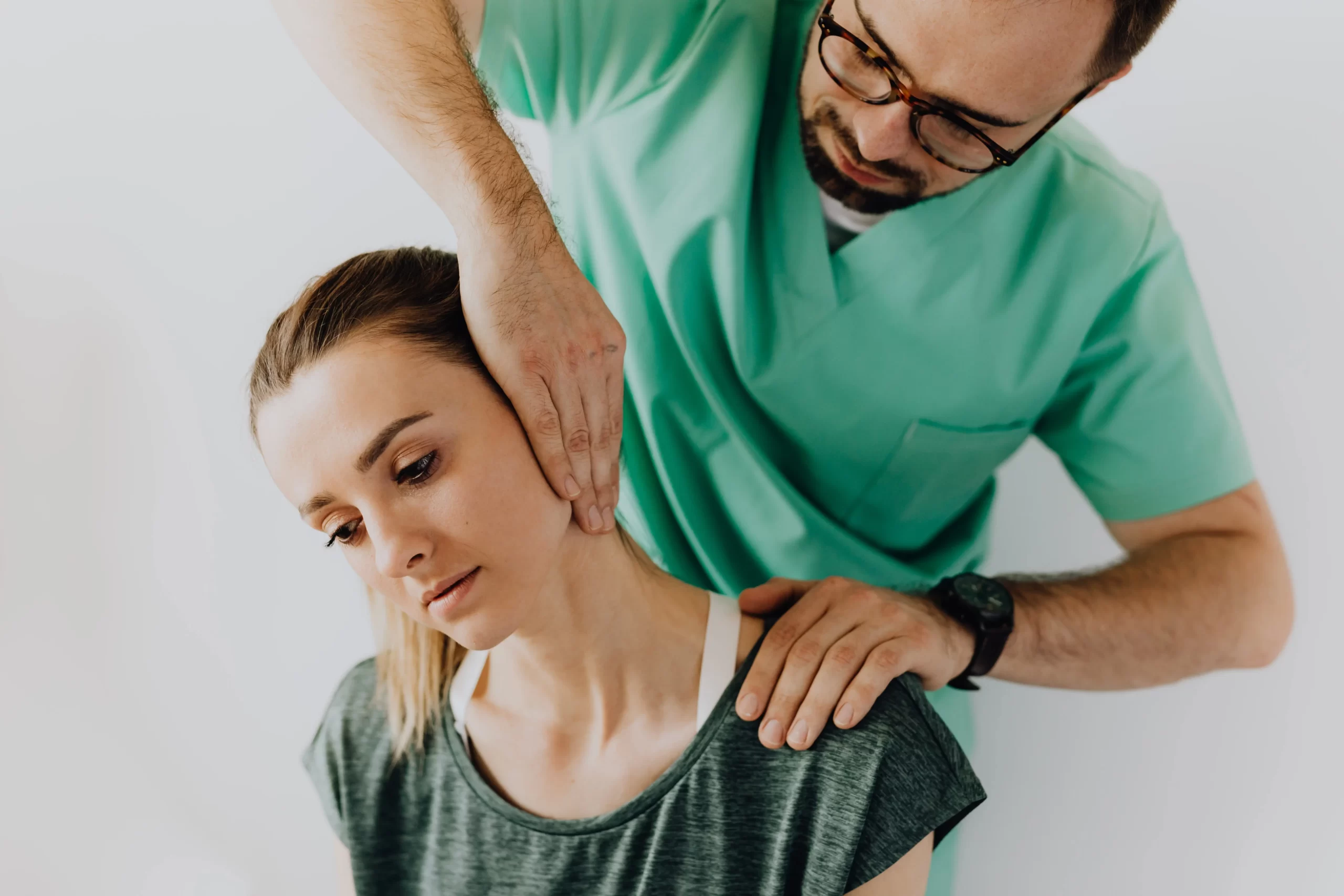 Chiropractor Treating Woman